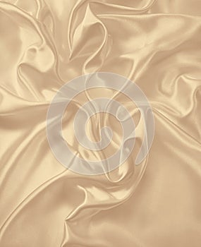 Smooth elegant golden silk as wedding background. In Sepia toned