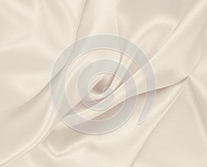 Smooth elegant golden silk or satin luxury cloth texture as wedding background. Luxurious background design. In Sepia toned. Retro