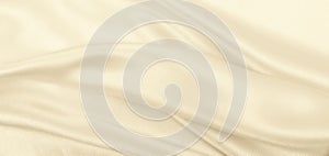 Smooth elegant golden silk or satin luxury cloth texture as wedding background. Luxurious background design. In Sepia toned. Retro