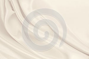 Smooth elegant golden silk or satin luxury cloth texture as wedding background. Luxurious background design. In Sepia toned. Retro