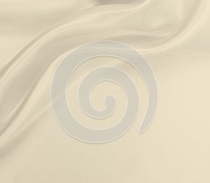 Smooth elegant golden silk or satin luxury cloth texture as wedding background. Luxurious background design. In Sepia toned. Retro