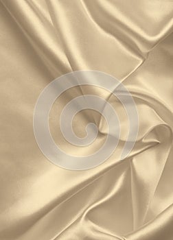 Smooth elegant golden silk or satin texture as background. In Se