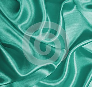 Smooth elegant green silk as background