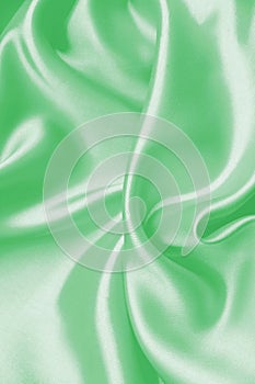 Smooth elegant green silk as background