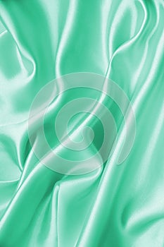 Smooth elegant green silk as background