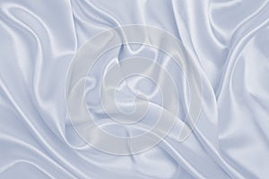 Smooth elegant grey silk or satin luxury cloth as wedding background. Luxurious background design