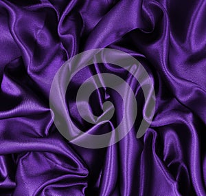 Smooth elegant lilac silk or satin luxury cloth texture as abstract background. Luxurious background design