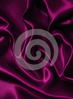 Smooth elegant pink silk or satin texture as background