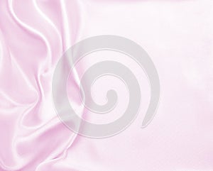 Smooth elegant pink silk or satin texture as wedding background.