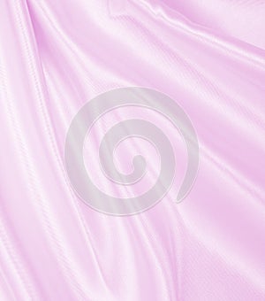 Smooth elegant pink silk or satin texture as wedding background. Luxurious background design