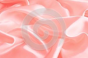 Smooth elegant pink silk or satin texture can use as abstract background, fabric