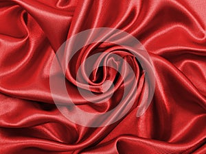 Smooth elegant red silk or satin luxury cloth texture as abstract background. Luxurious valentines day background design