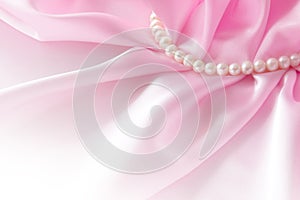 Smooth elegant rose silk background with pearl, Beautiful silk drapes
