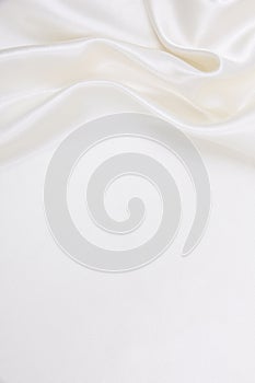 Smooth elegant white silk or satin luxury cloth texture as wedding background. Luxurious background design photo