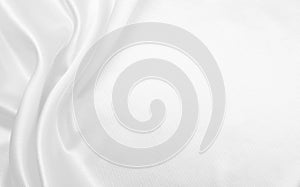 Smooth elegant white silk or satin luxury cloth texture as wedding background. Luxurious background design