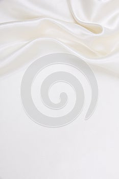 Smooth elegant white silk or satin luxury cloth texture as wedding background. Luxurious background design