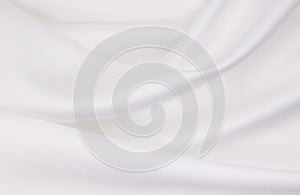 Smooth elegant white silk or satin luxury cloth texture as wedding background. Luxurious background design