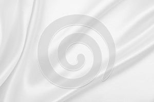 Smooth elegant white silk or satin luxury cloth texture as wedding background. Luxurious background design