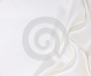 Smooth elegant white silk or satin luxury cloth texture as wedding background. Luxurious background design