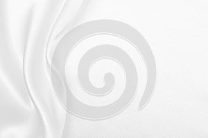 Smooth elegant white silk or satin luxury cloth texture as wedding background. Luxurious background design