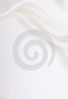 Smooth elegant white silk or satin luxury cloth texture as wedding background. Luxurious background design