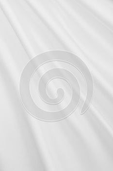 Smooth elegant white silk or satin luxury cloth texture as wedding background. Luxurious background design