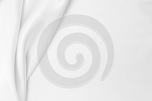 Smooth elegant white silk or satin luxury cloth texture as wedding background. Luxurious background design