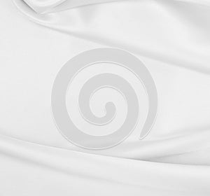 Smooth elegant white silk or satin luxury cloth texture as wedding background. Luxurious background design