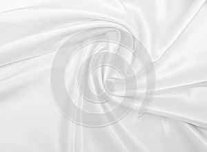 Smooth elegant white silk or satin luxury cloth texture as wedding background. Luxurious Christmas background or New Year