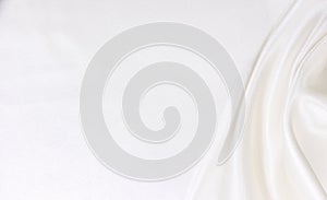 Smooth elegant white silk or satin luxury cloth texture as wedding background. Luxurious Christmas background or New Year