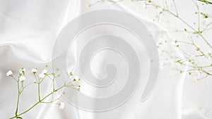 Smooth elegant white silk or satin luxury cloth texture. Tender wedding background. Luxurious background design. Copy space