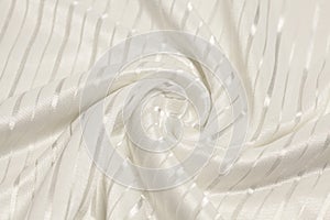 Smooth elegant white silk or satin luxury fabric texture. Top view