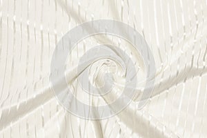 Smooth elegant white silk or satin luxury fabric texture. Top view