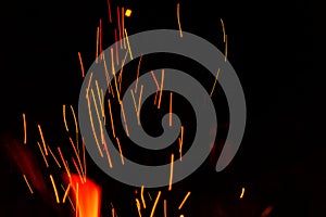 Fire Sparks for digital compositing on Black Background photo