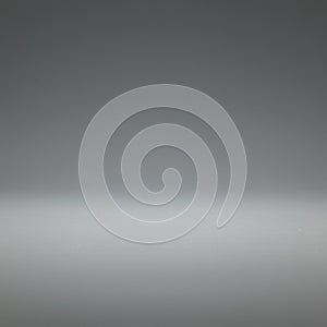 A smooth gradient background transitioning from dark gray at the top to lighter gray at