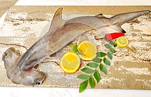 Smooth Hammerhead Shark decorated with herbs and fruits. isolated on white Background.Selective focus