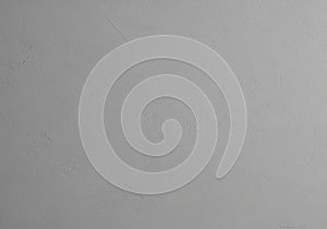 Smooth, light gray concrete wall texture with subtle irregular