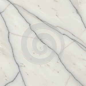 Smooth marble surface featuring a classic white base with subtle grey veining,