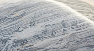 Smooth marble surface with natural veining
