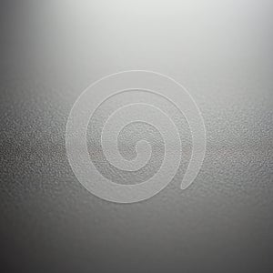 Smooth metallic surface with a subtle gradient effect. The texture appears slightly