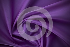 smooth purple cotton Texture, curved silk background, pattern. Texture of purple silk fabric