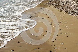 Smooth round pebble stones on the beach