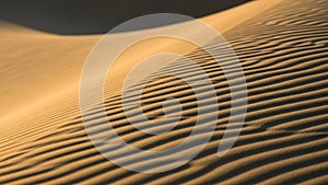 Showcases the intricate design of the wind formed lines while