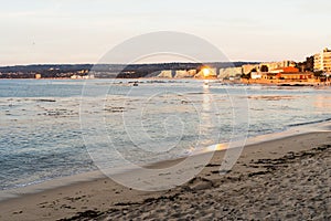 Smooth sea shore at sunset in Algarrobo beach, Chile photo