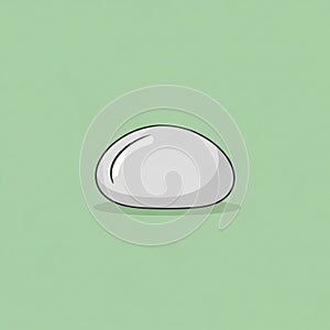 Smooth shiny oval shaped stone with a light gray color sits against a