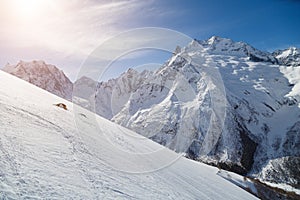 Smooth ski slopes of the Caucasus Mountains on a sunny winter day