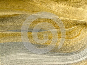 Smooth surface of layered sandstone sediment rock photo