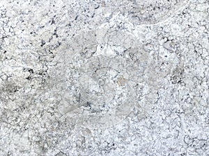 Smooth surface of old marble white stone. Texture mineral background