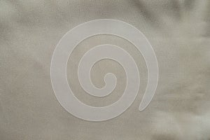 Smooth surface of light beige rayon fabric photo