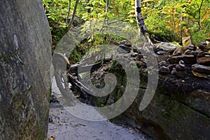 Smooth surfaces of stone megaliths in the town of Kamenny Gorod hint at their artificial origin